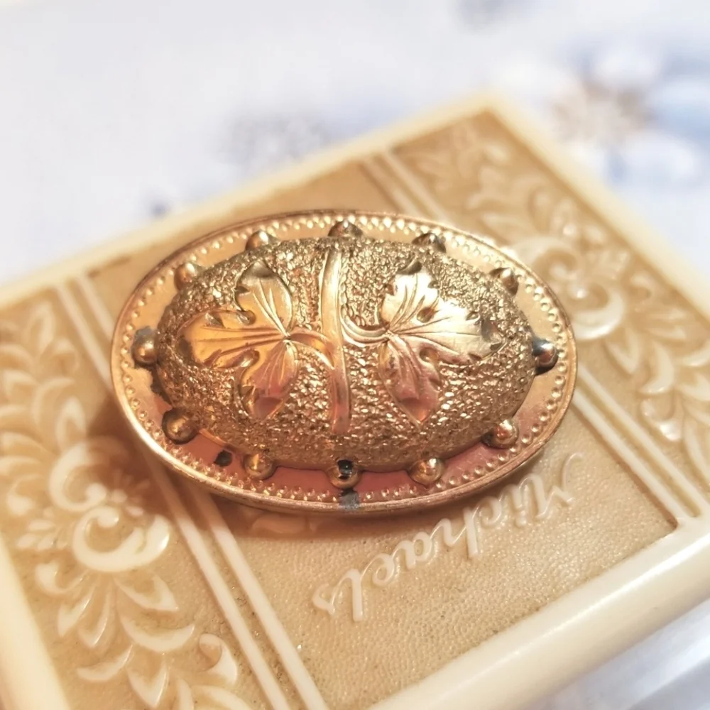 1870s Victorian Era Gold Filled Reppousse Brooch
